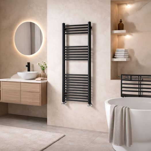 Matt black ladder towel radiator on a warm beige bathroom wall beside a freestanding bath